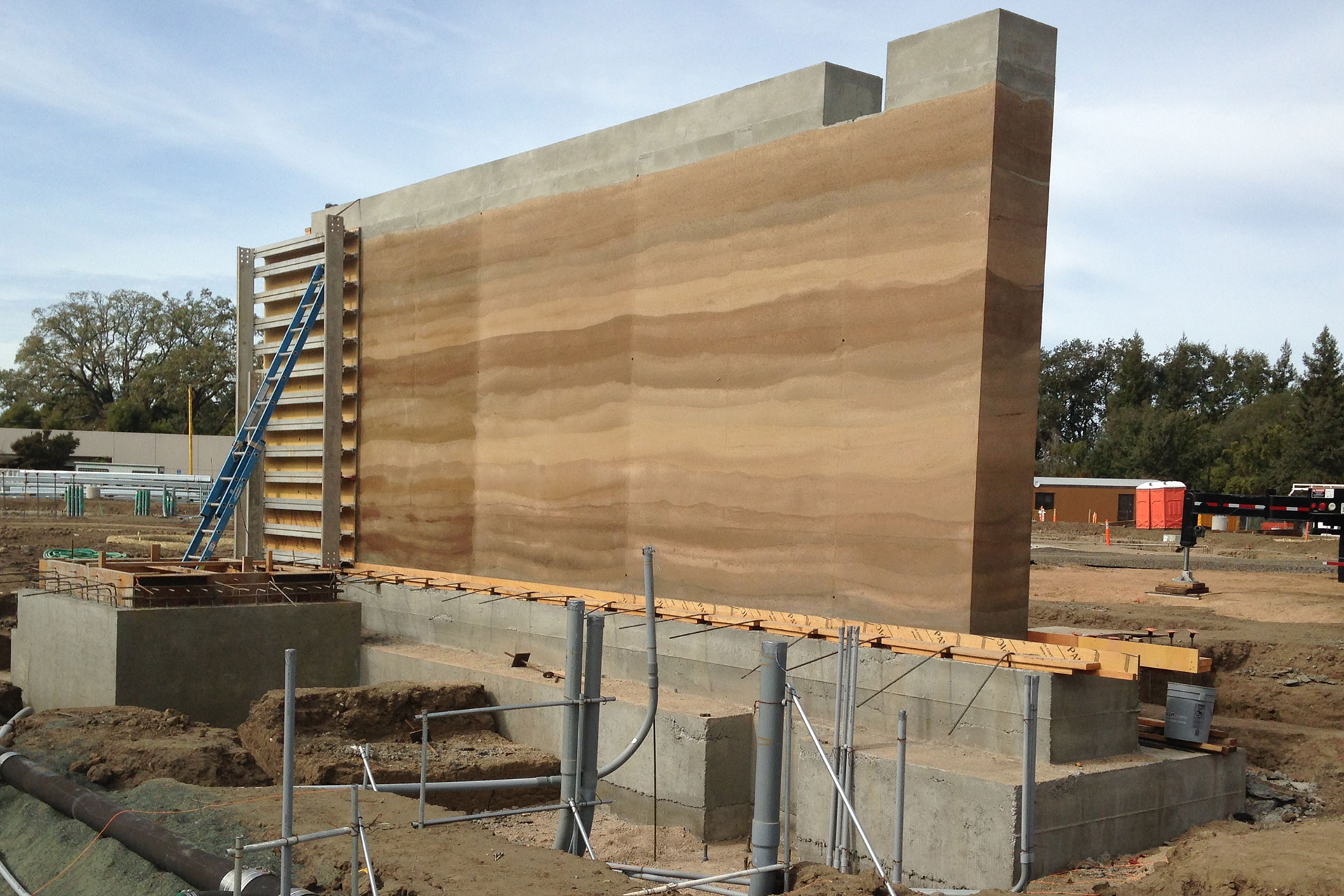 Rammed Earth Wall Rises At Tlcd Project Tlcd Architecture 