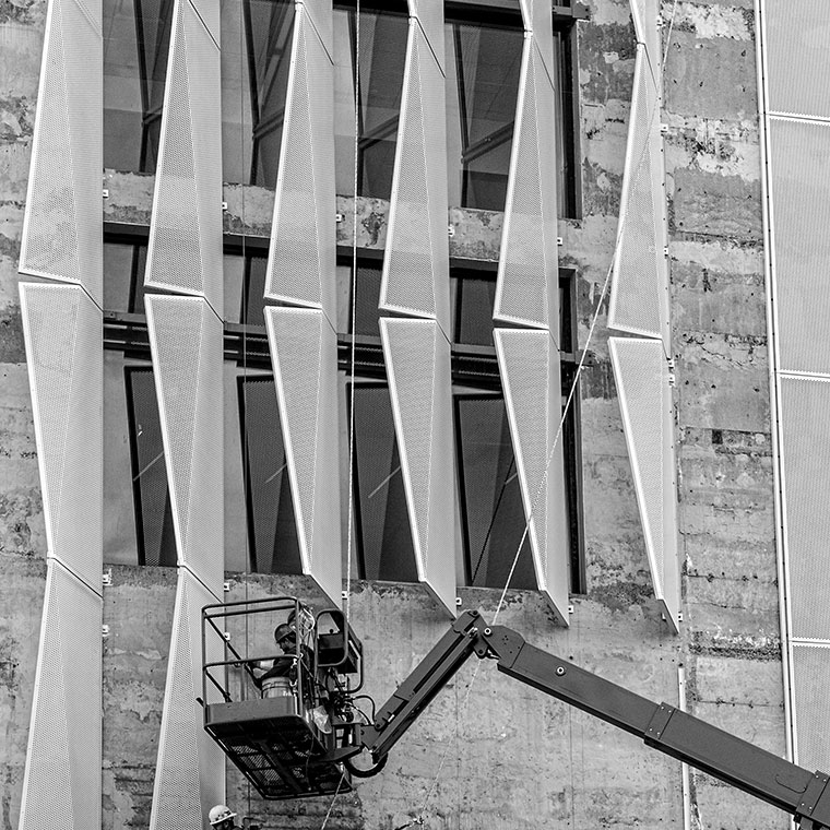 Bent Origami Panels Going Up on Museum on the Square