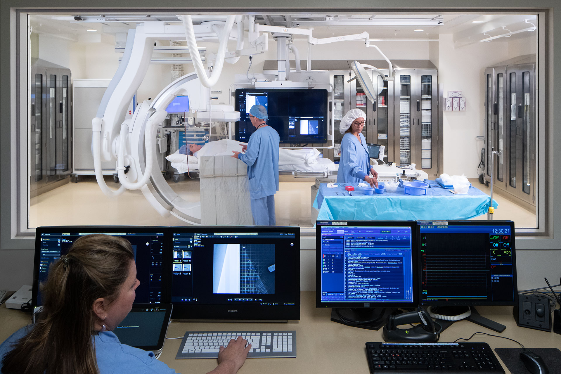 Kaiser Permanent San Rafael Diagnostic and Treatment Suites - IR/Cath Lab technicians behind glass