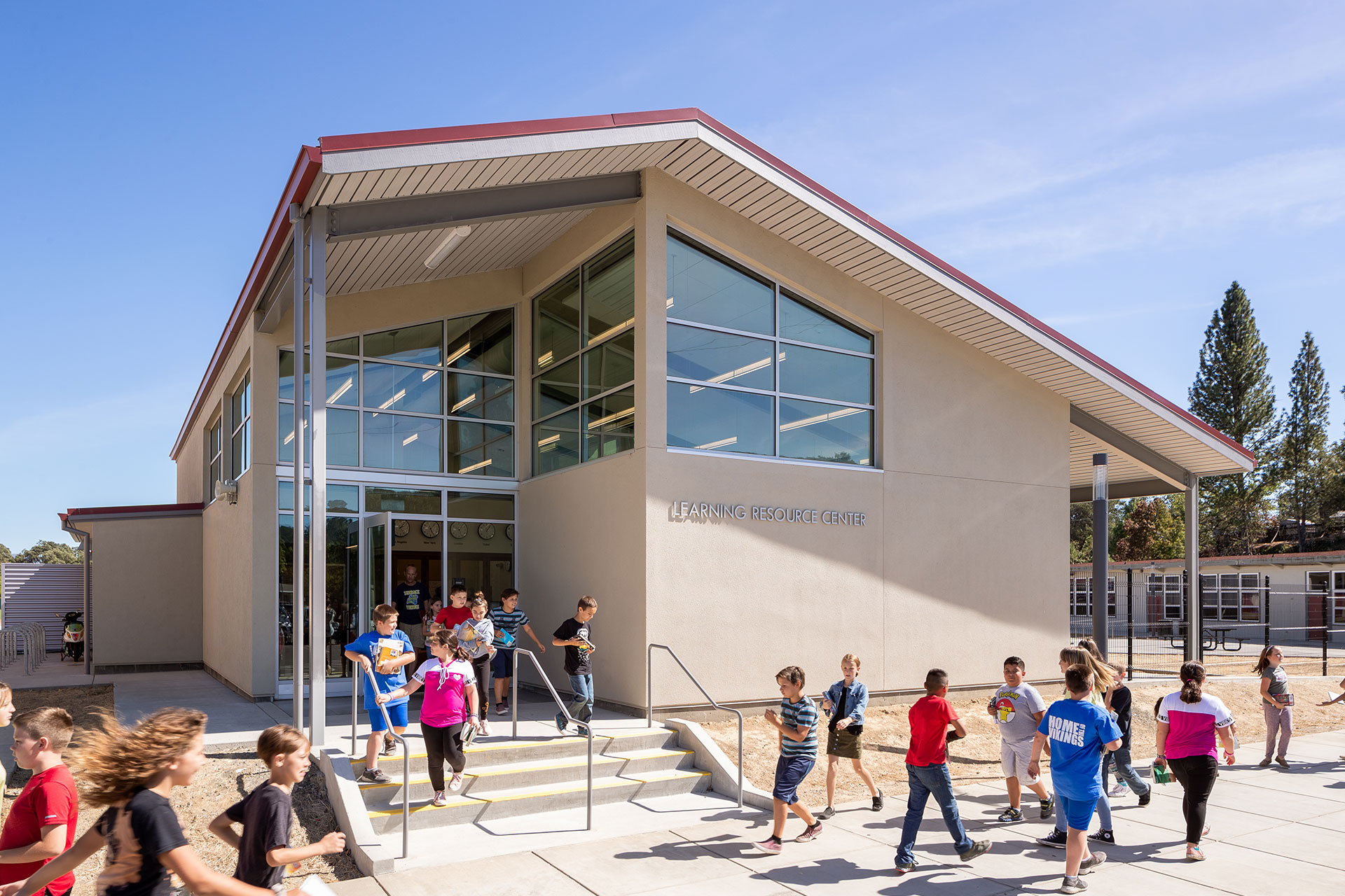 Students walking out the entrance of Learning Resource Center at Terrace Middle School