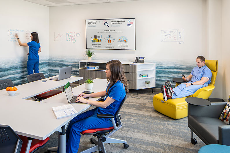 3 residency doctors using lounge area