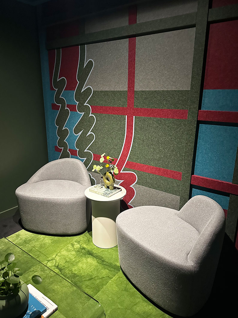 Neocon 2023 furniture showroom with carpeted wall art