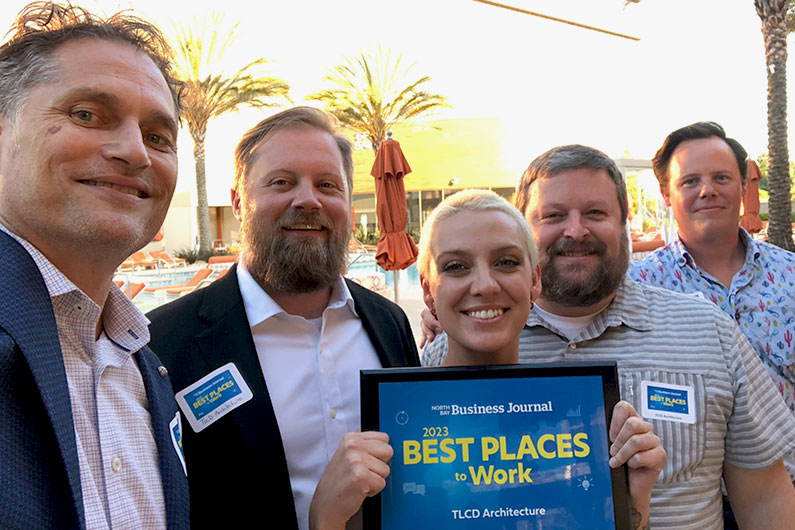 TLCD group of 5 at Best Places to Work Awards holding plaque