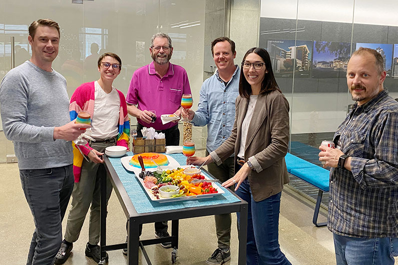 TLCD team celebrating Pride Month at office presentation