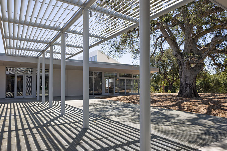 Outdoor photo of covered lattice walkway at West Valley College Visual Arts Building