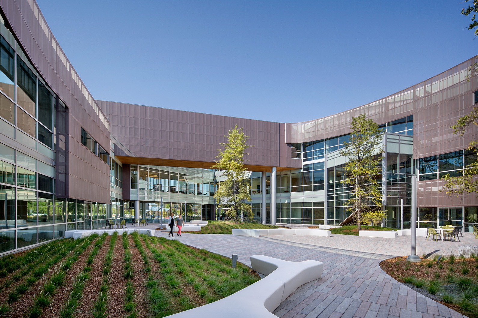 Exterior view of courtyard at American AgCredit creates zones for people to hang out with thoughtful landscaping
