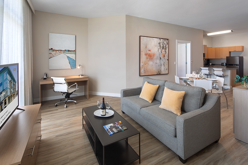 Interior photos of living room and kitchen at Art House extended stay in Santa Rosa, CA