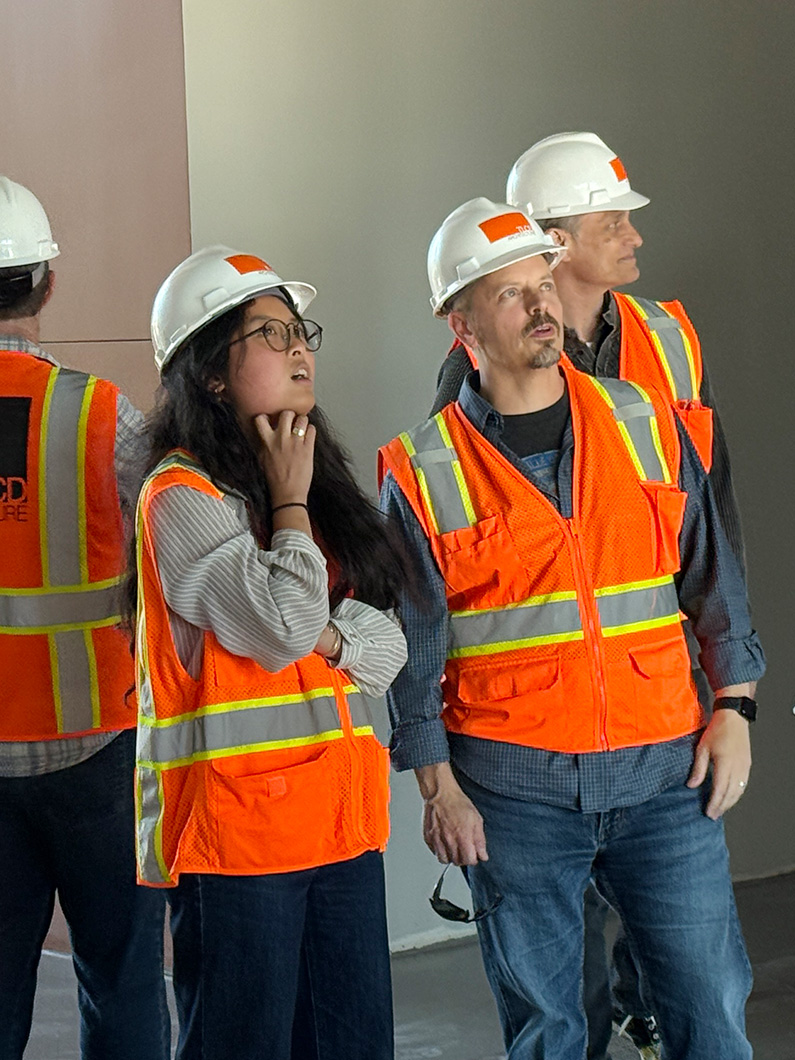Jessica on Montgomery High School Site tour talking to TLCD Architect