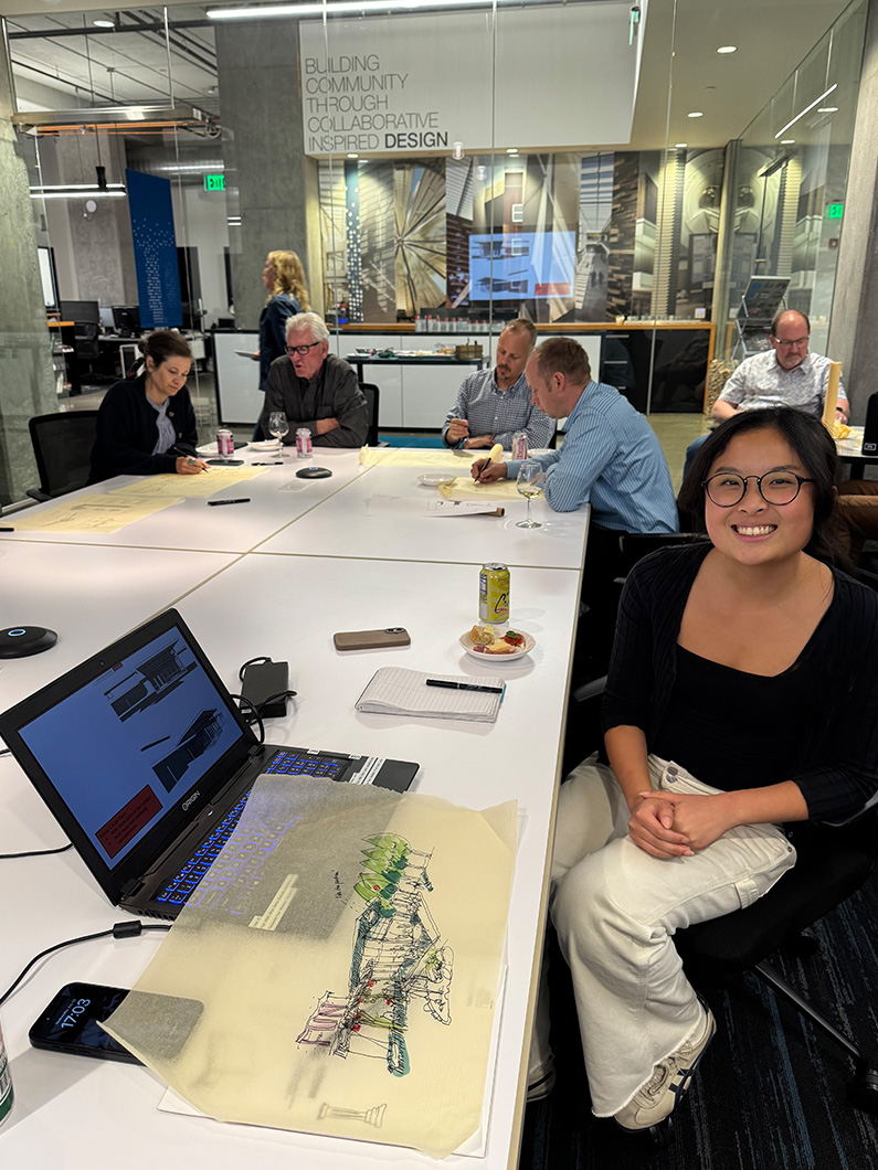 Jessica helping to present an Education Studio design charette at TLCD office