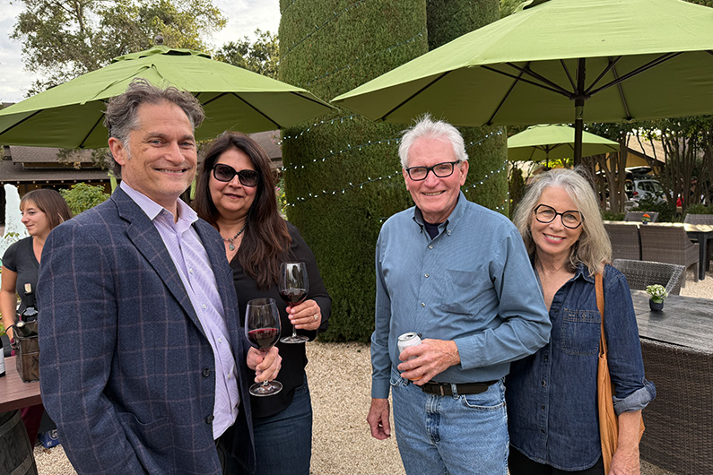 Two couples at TLCD summer picnic at Landmark VIneyards
