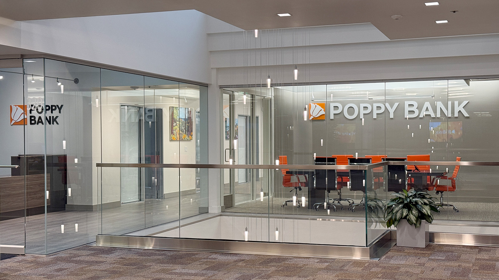 Photo of Poppy Bank's full height glass tenant suite